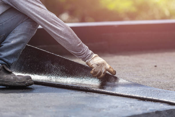 Professional Basement Waterproofing technician working in Fort Thomas, KY